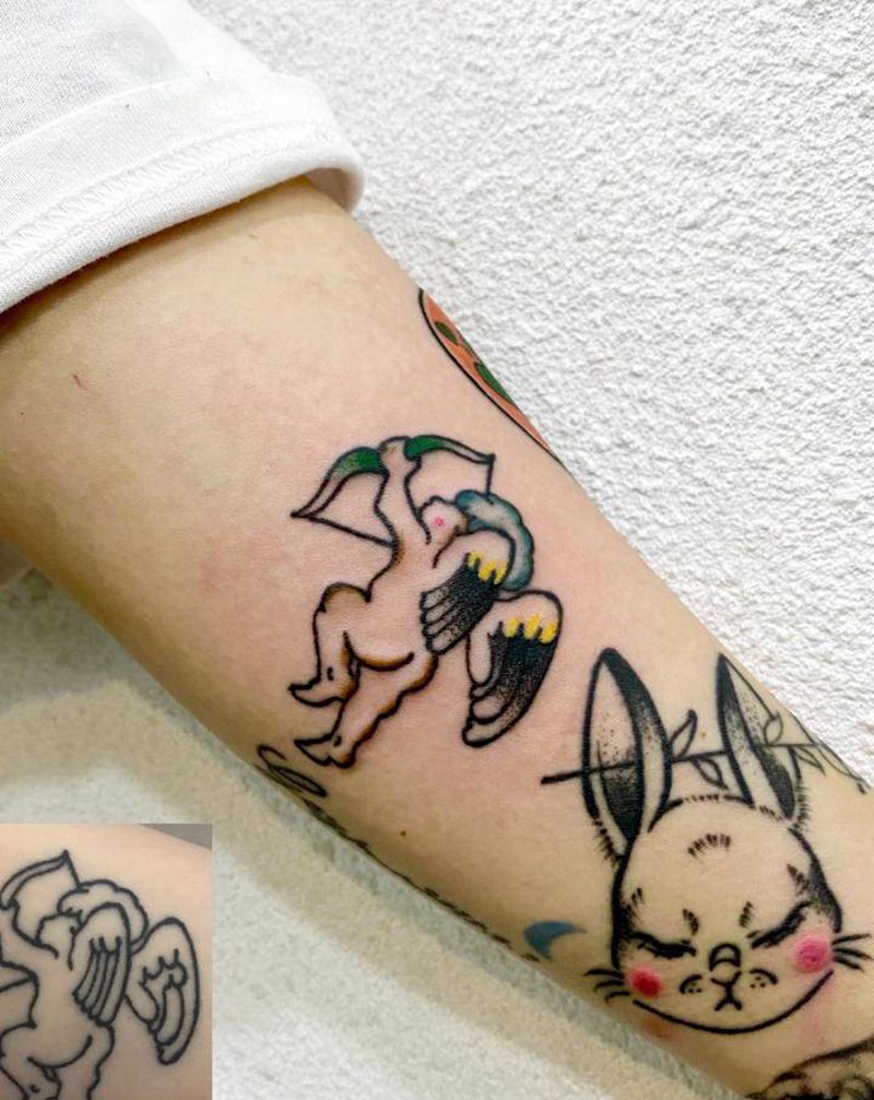 小天使纹身图片_手臂New School纹身图案