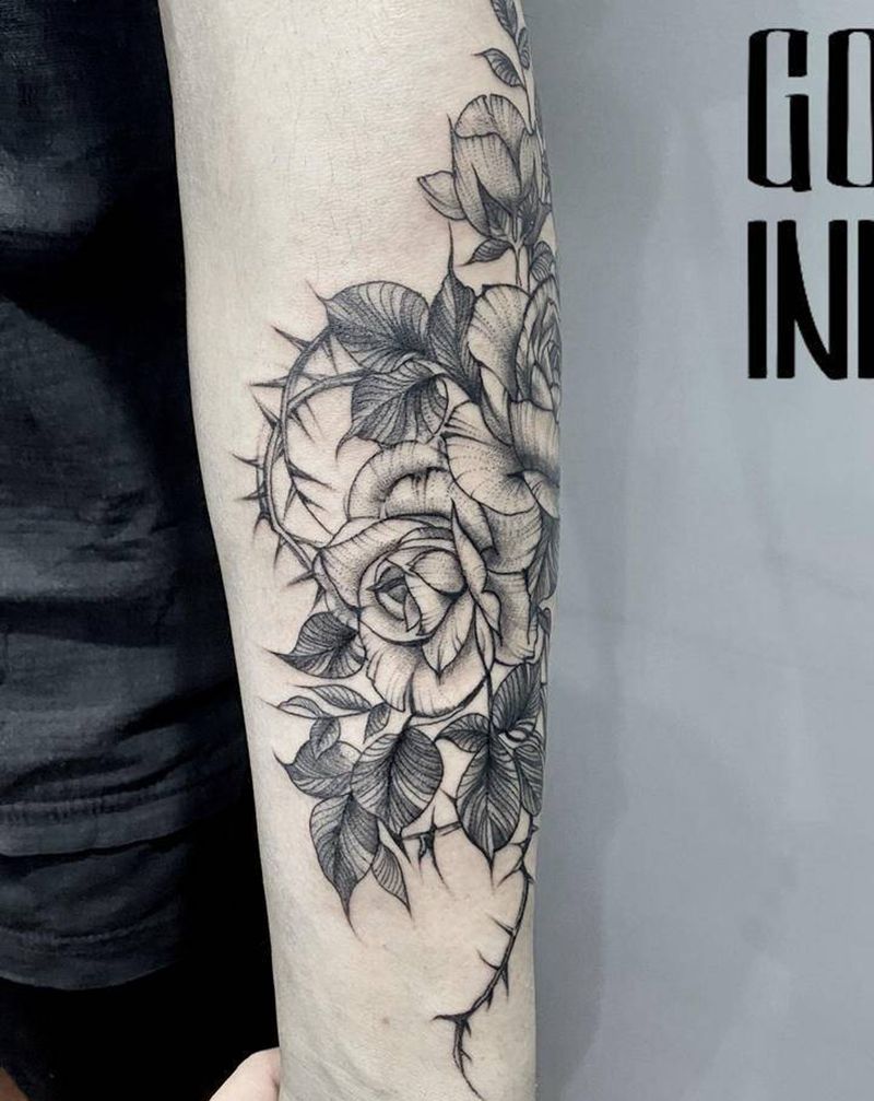 荆棘与花纹身图片_手臂点刺纹身图案