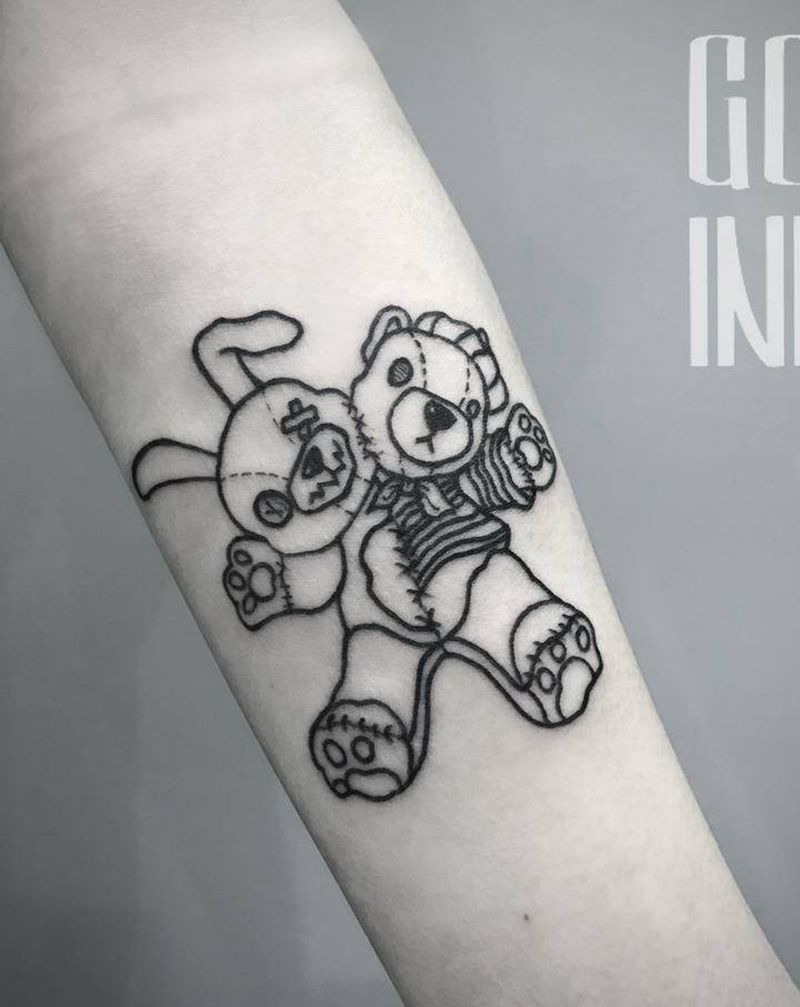 玩偶纹身图片_手臂纹身图案