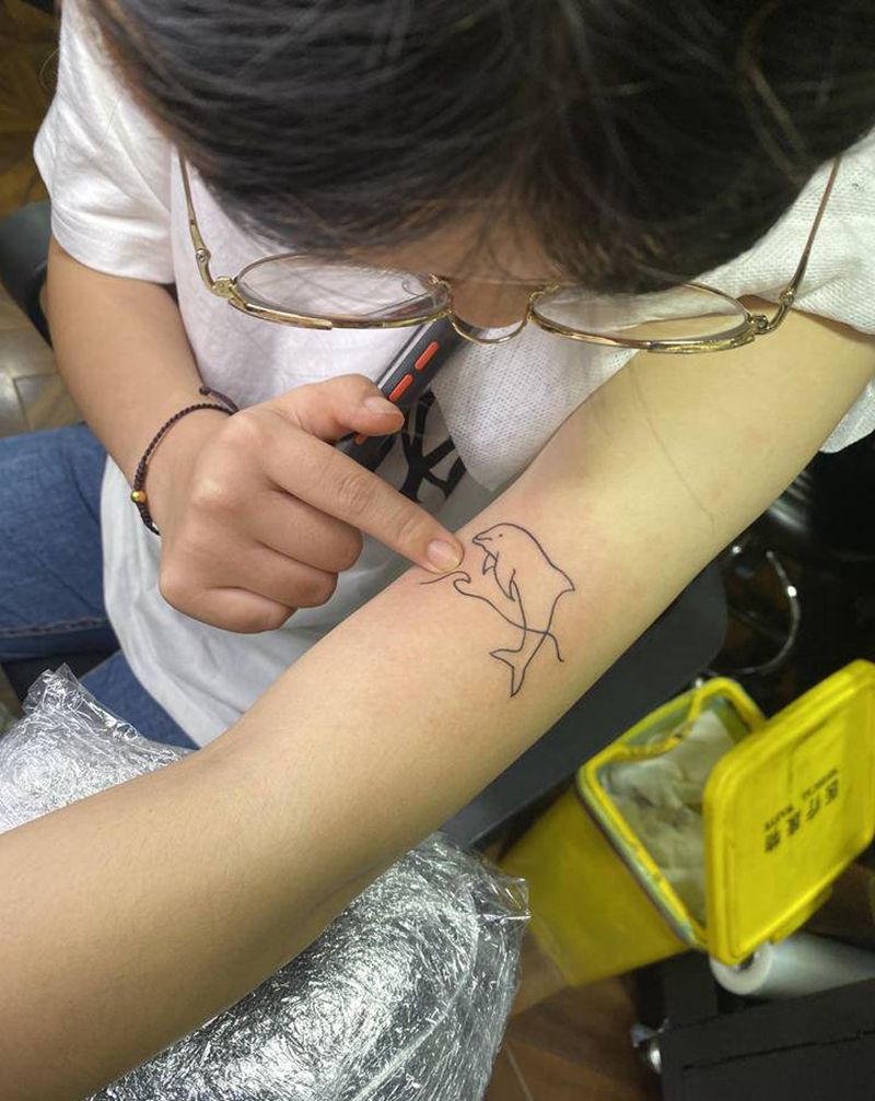 快乐纹身图片_手臂纹身图案