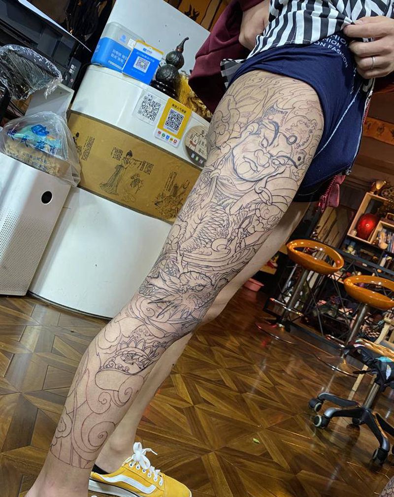 天王纹身图片_腿部纹身图案