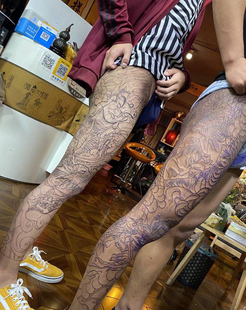 大腿子纹身图片_腿部纹身图案