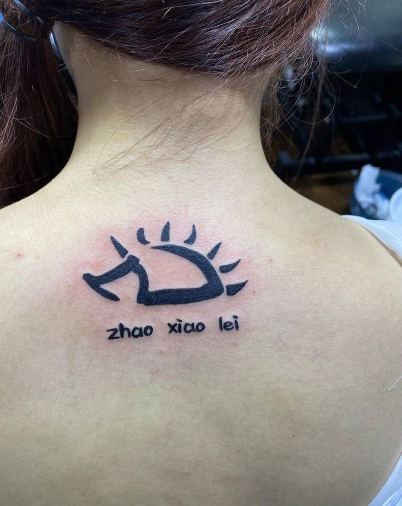 可耐纹身图片_背部纹身图案