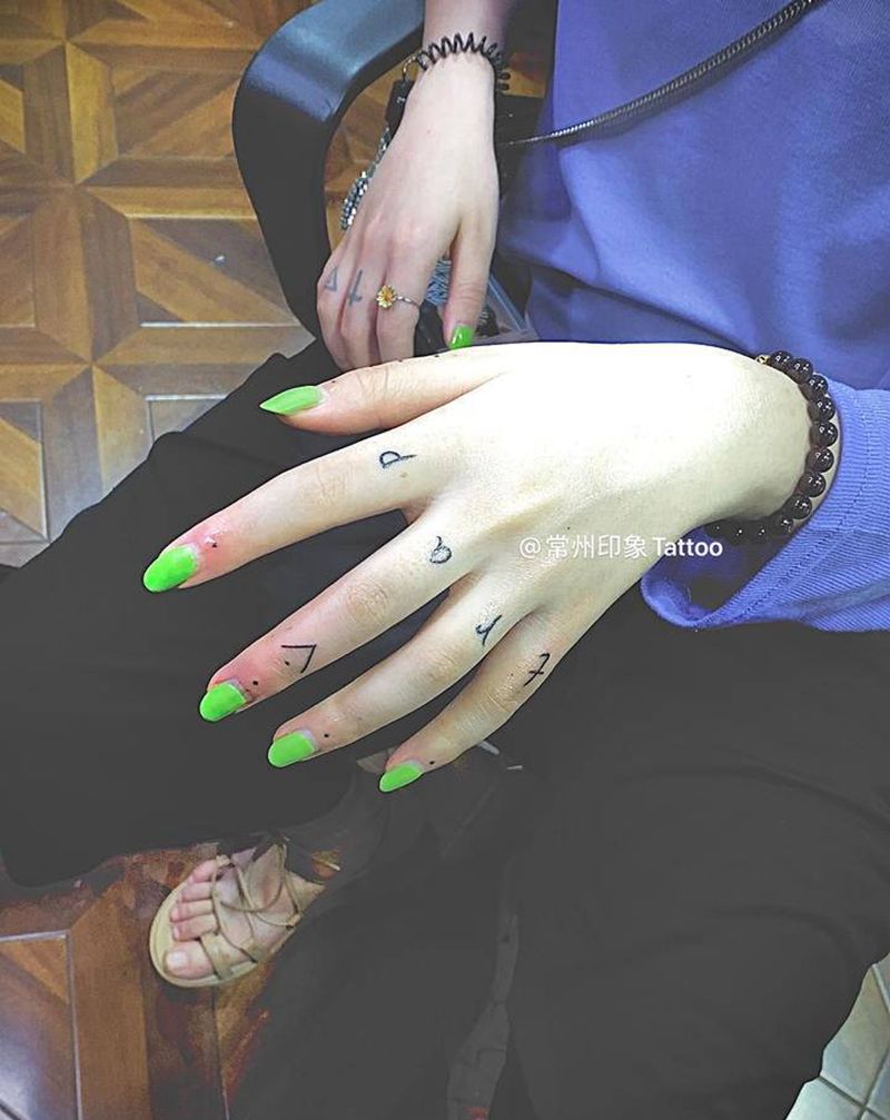 哒哒纹身图片_手臂纹身图案