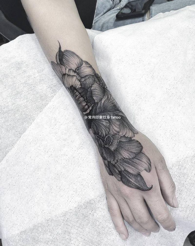 花纹身图片_手臂欧美写实纹身图案