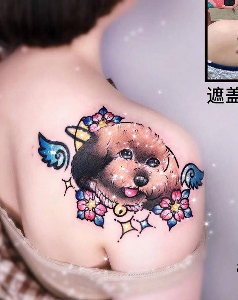 New school狗纹身图片_肩部New School狗翅膀花纹身图案