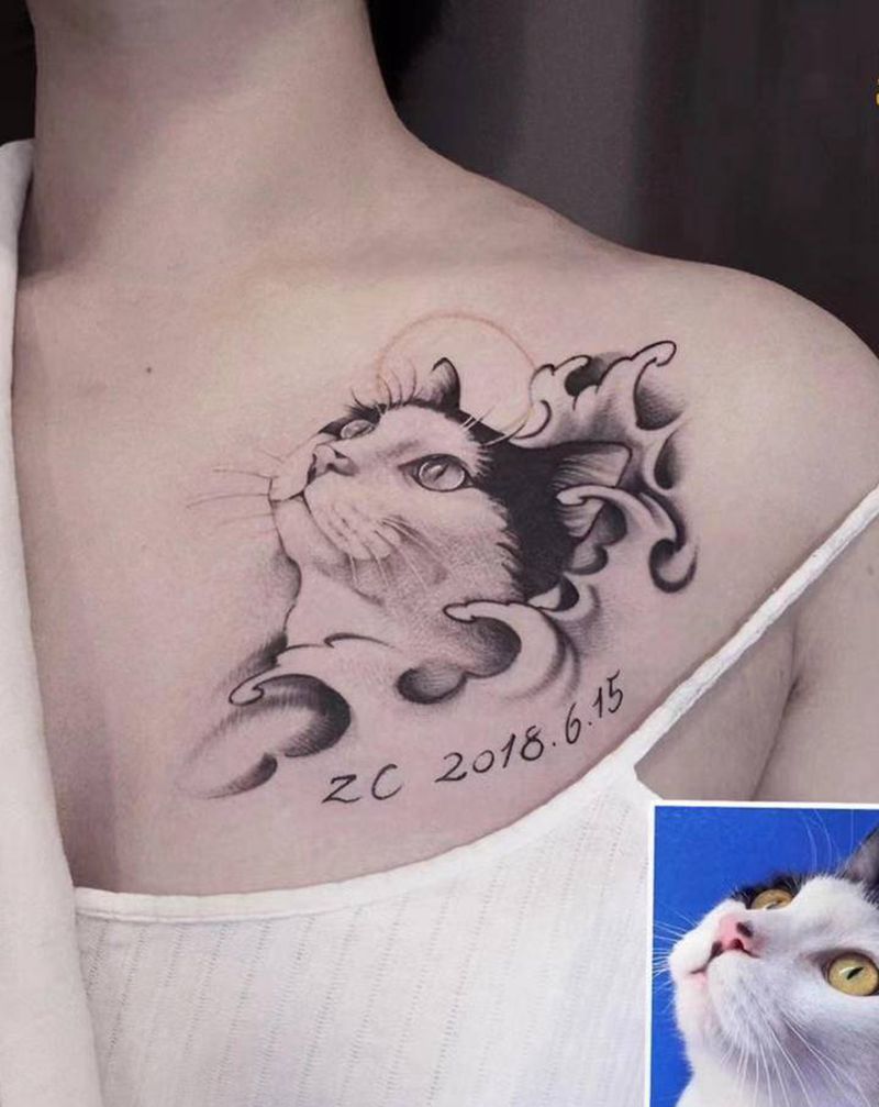 宠物猫·写实纹身图片_肩部胸部欧美写实猫纹身图案