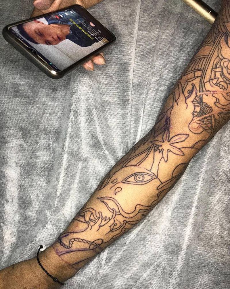 花臂未完成纹身图片_手臂老传统纹身图案