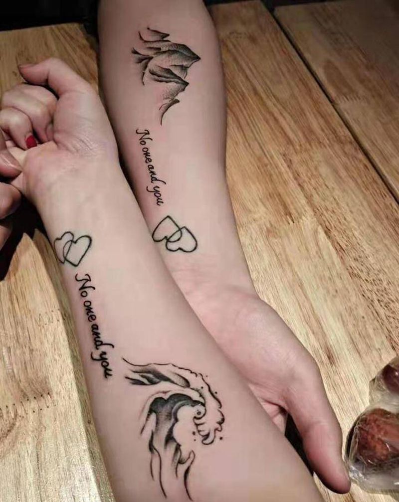 情侣纹身纹身图片_手臂几何纹身图案