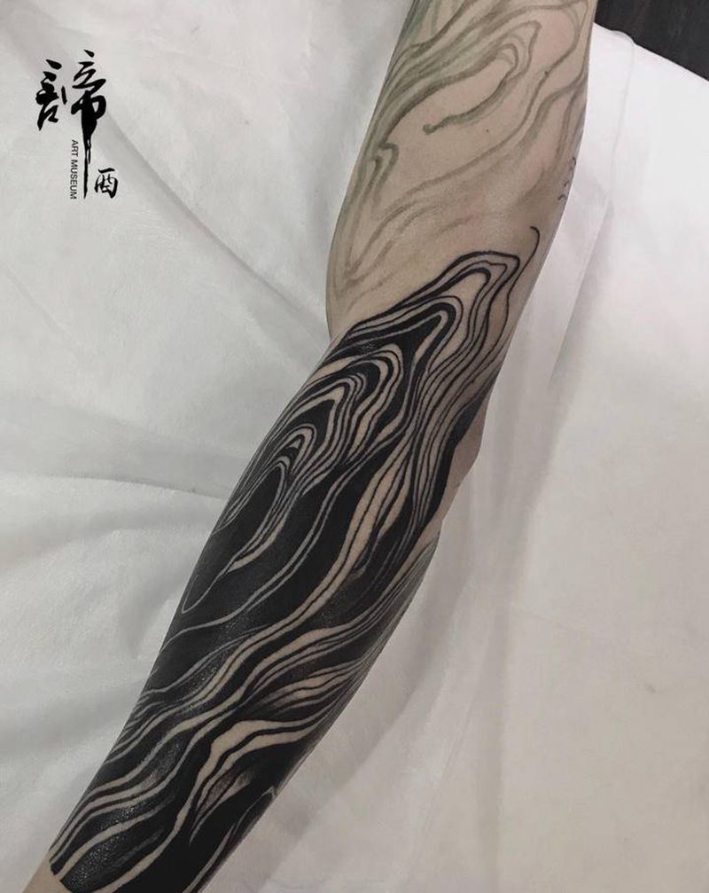 年轮纹身图片_手臂几何纹身图案