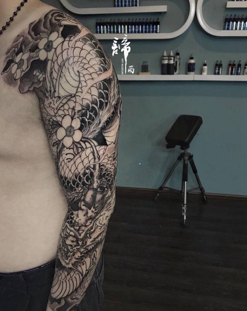 新传统龙纹身图片_手臂新传统纹身图案
