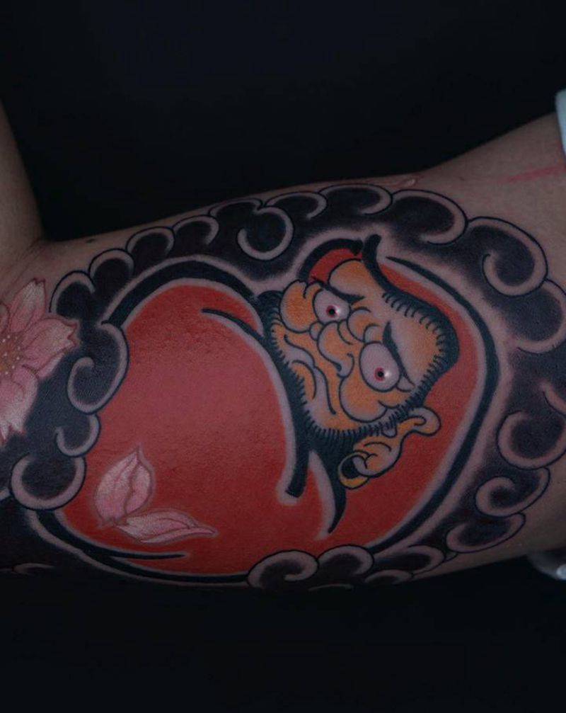 许愿达摩纹身图片_手臂手部老传统新传统纹身图案