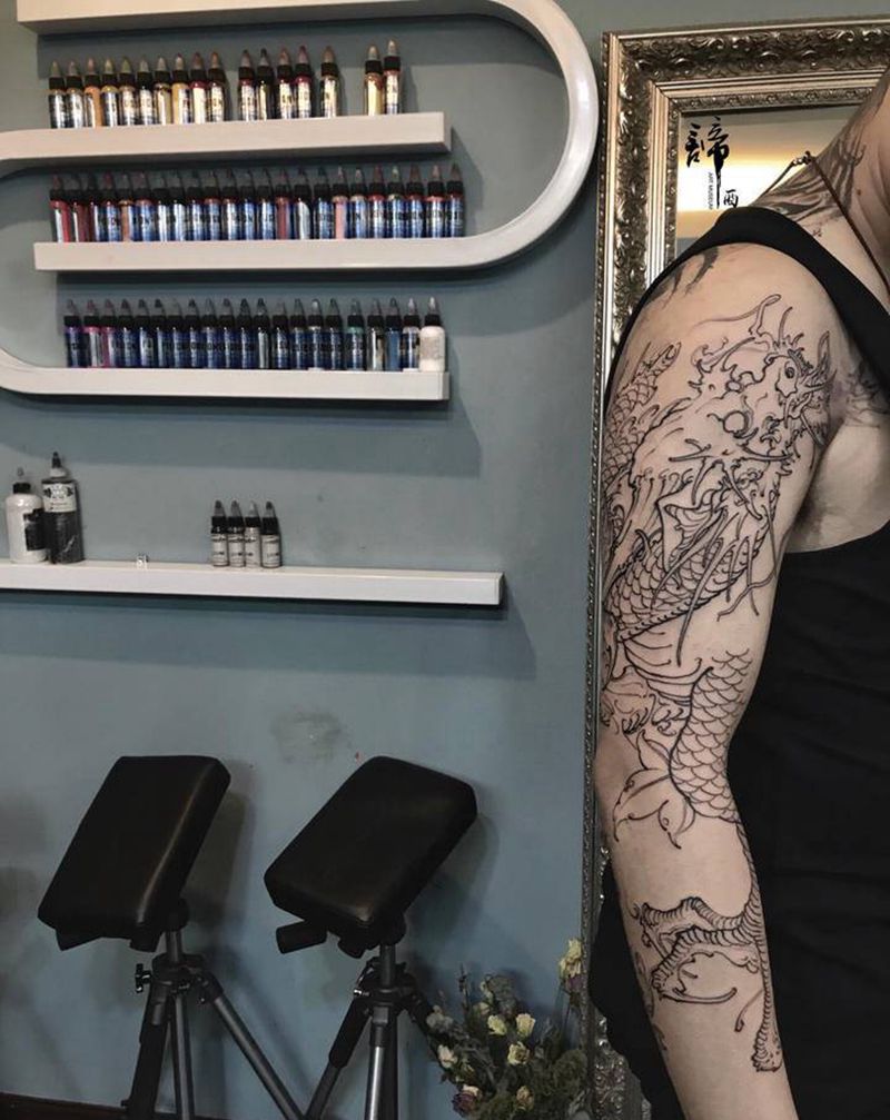 新传统龙纹身图片_手臂新传统纹身图案