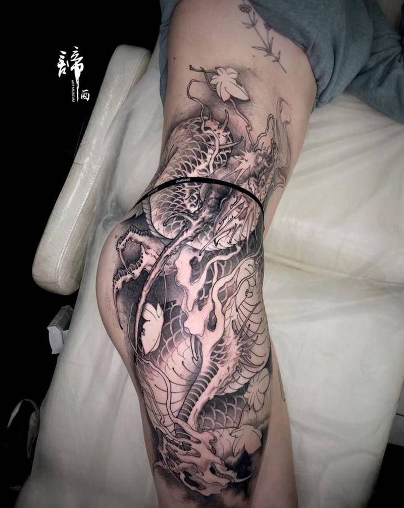 新传统大腿外侧龙纹身图片_腰部腹部新传统纹身图案