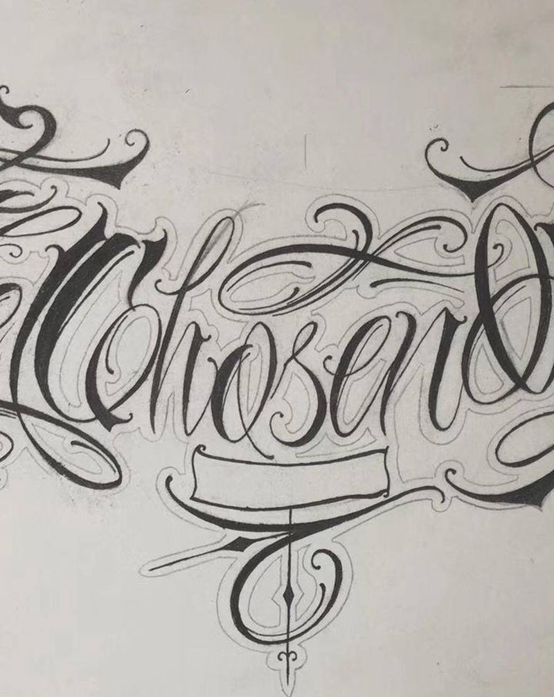 花体字纹身图片_胸部花体字纹身图案