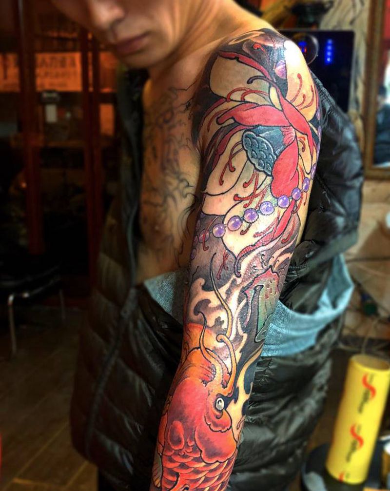 新传统鱼纹身图片_手臂新传统鱼新传统手绘设计纹身图案