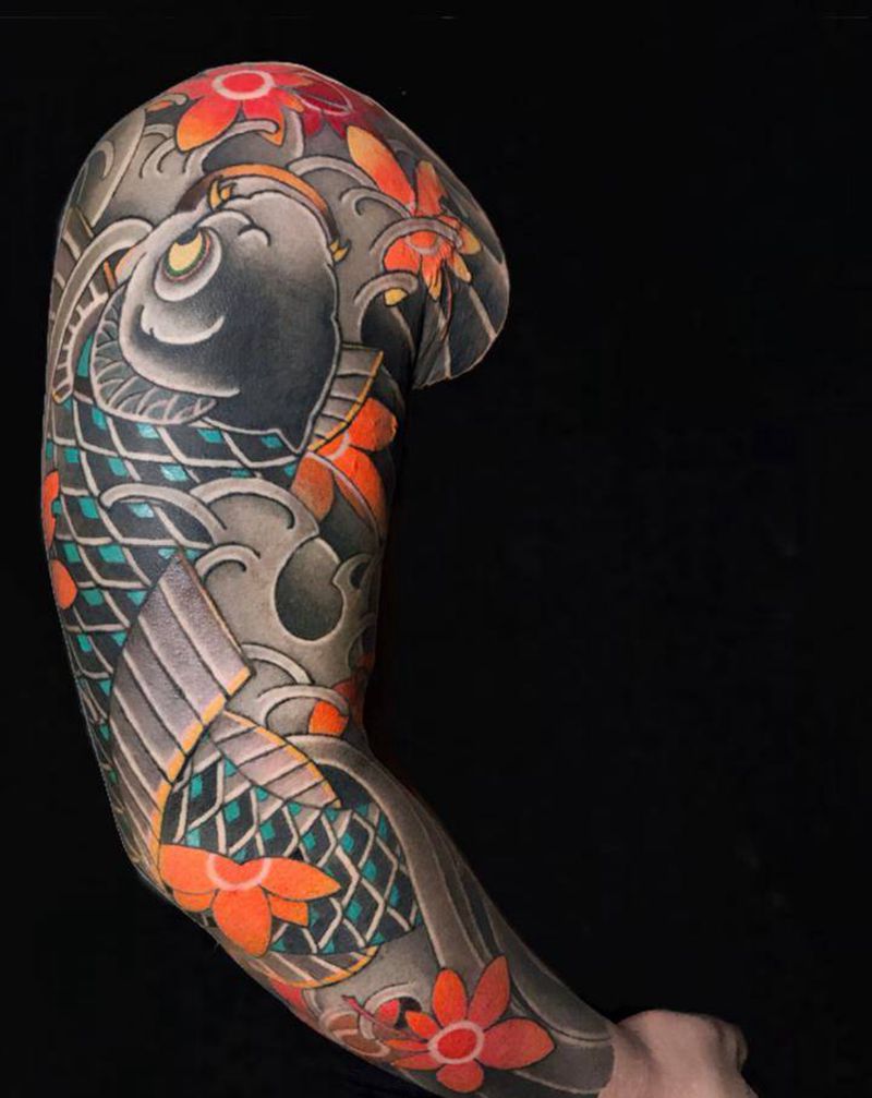 鱼纹身图片_手臂老传统纹身图案