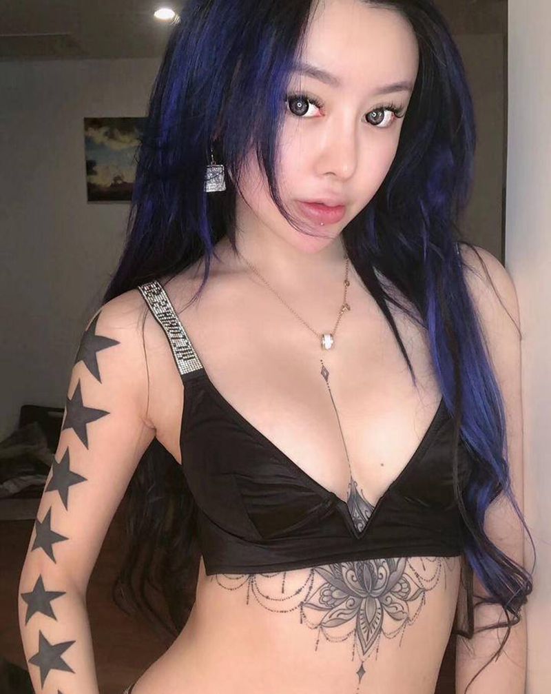 美女DJ买家秀纹身图片_手臂胸部图腾点刺纹身图案