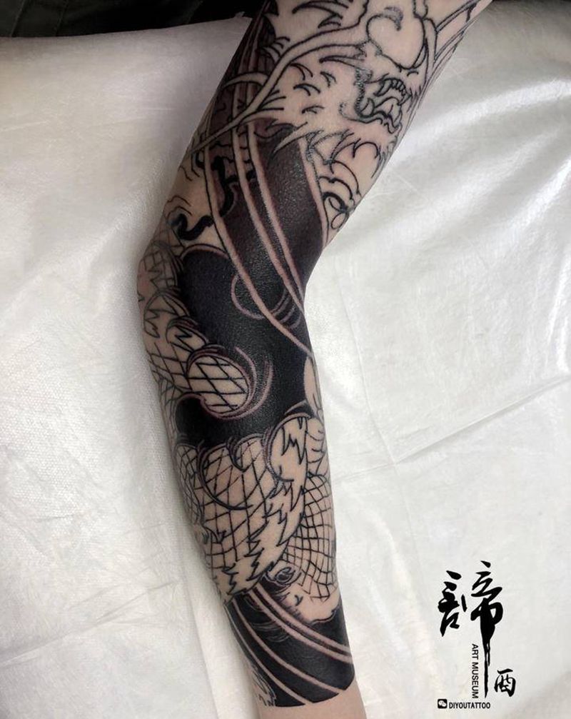 花臂龙纹身图片_手臂手部老传统新传统纹身图案