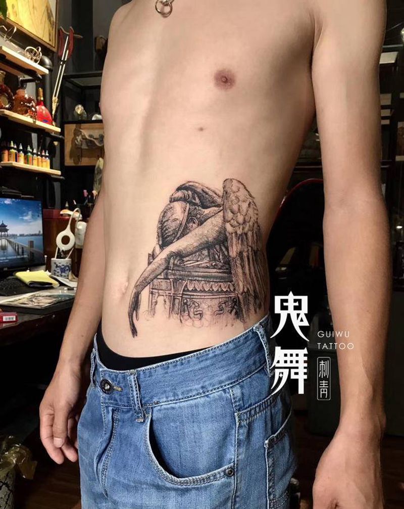 速写纹身图片_腰部欧美写实纹身图案