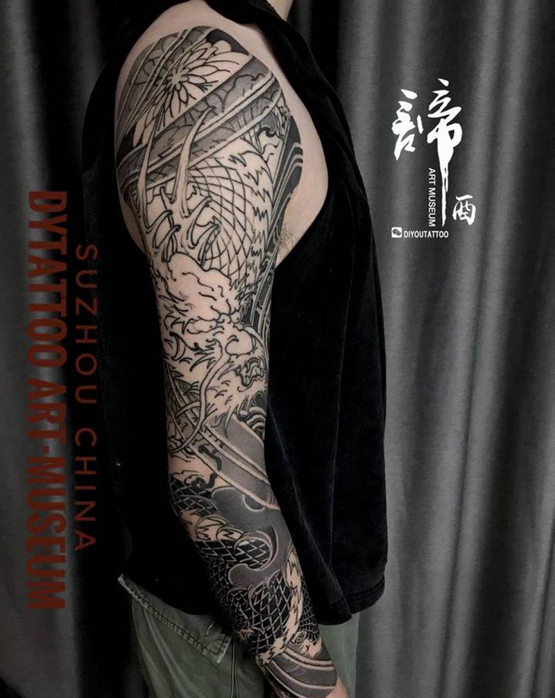 花臂龙纹身图片_手臂手部老传统新传统纹身图案