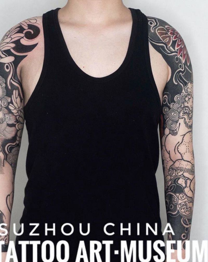 双花臂唐狮纹身图片_手臂手部老传统新传统纹身图案