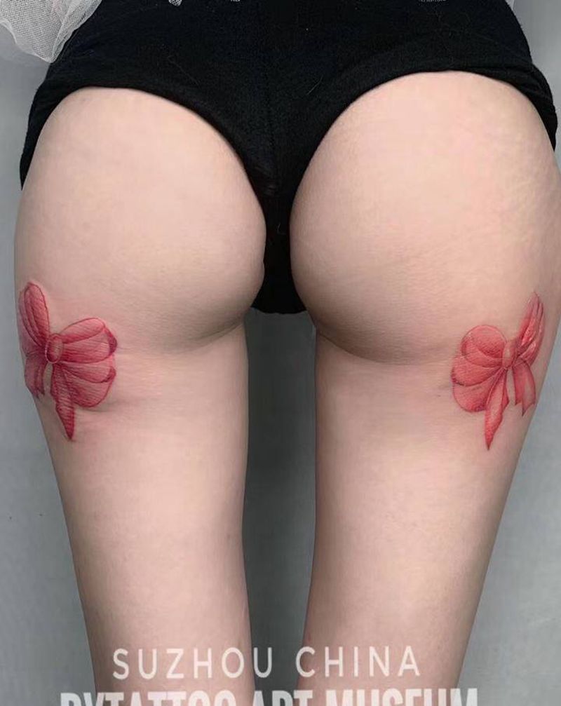 蝴蝶结纹身图片_手臂手部老传统新传统纹身图案