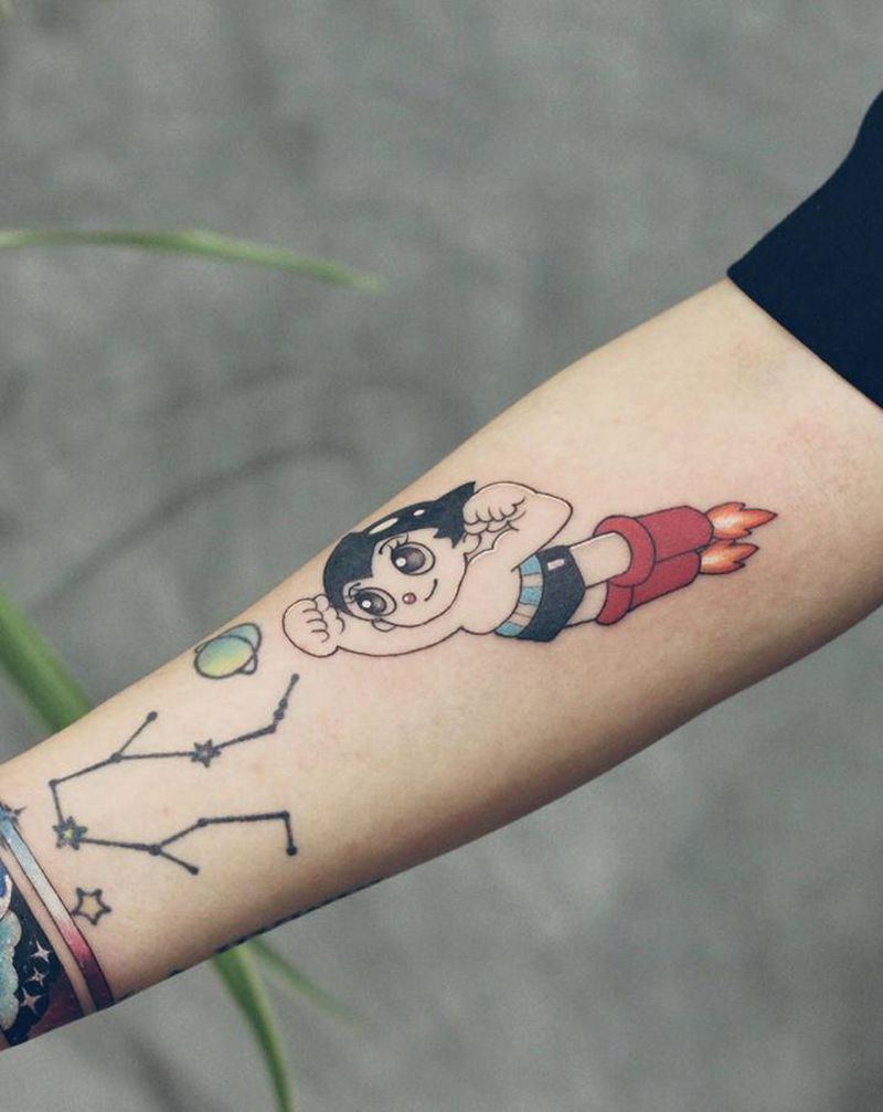 小臂阿童木星空手环纹身图片_手臂水彩阿童木星空手环纹身图案