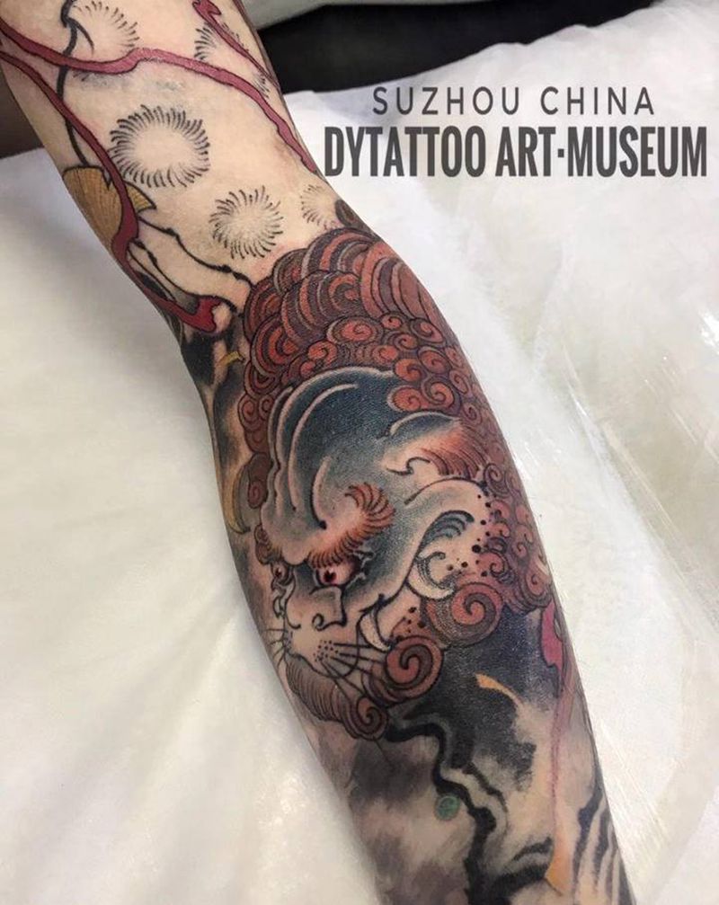 唐狮纹身图片_手臂老传统纹身图案