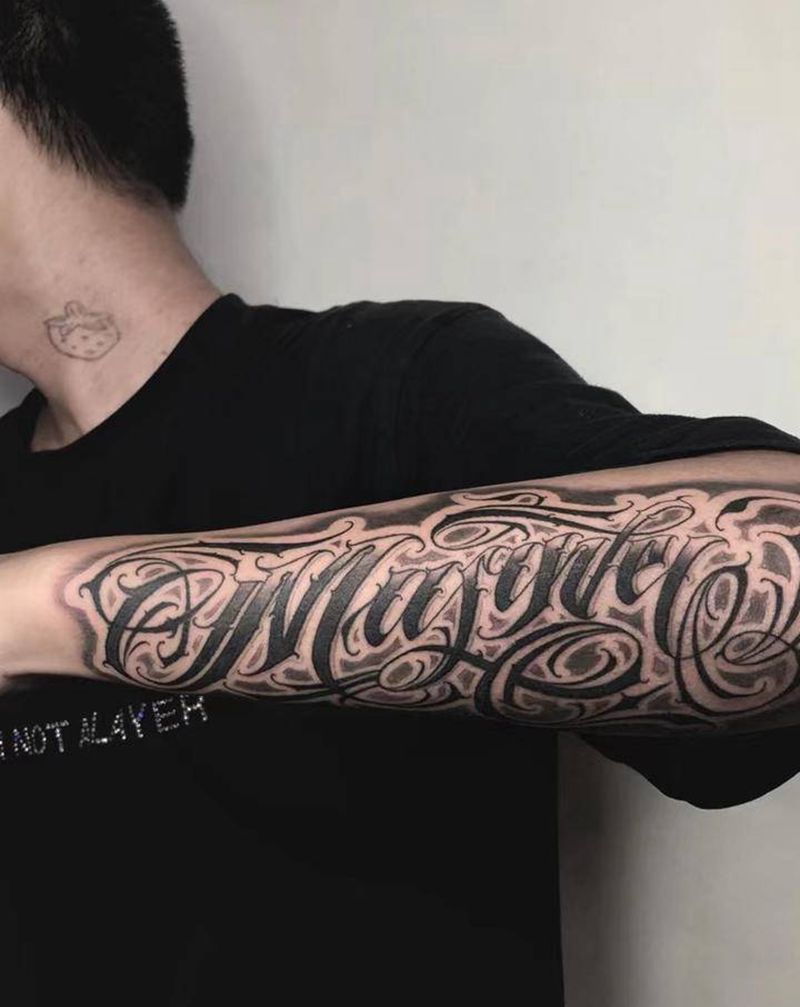 订制花体字［Masiwei］纹身图片_手臂花体字Masiwei纹身图案