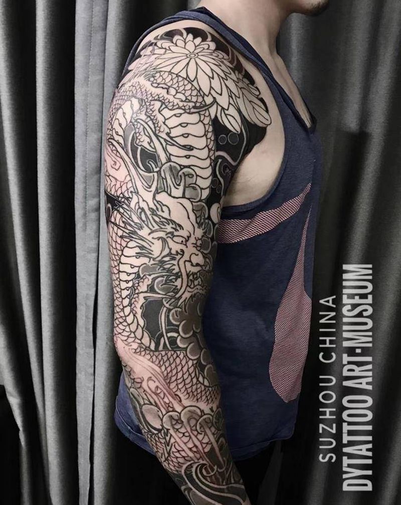 花臂龍纹身图片_手部手臂老传统新传统纹身图案