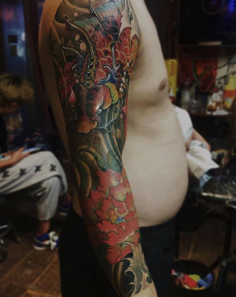 花臂鱼纹身图片_手臂新传统遮盖鱼新传统鱼鱼纹身图案