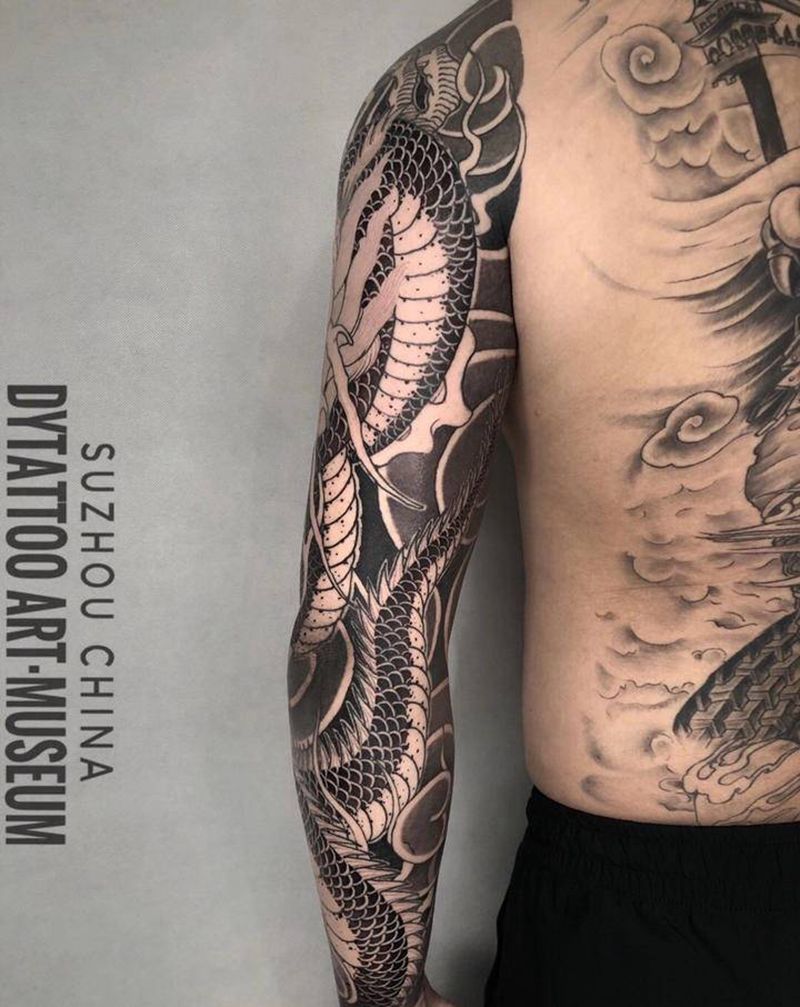 花臂龙纹身图片_手部手臂老传统新传统纹身图案