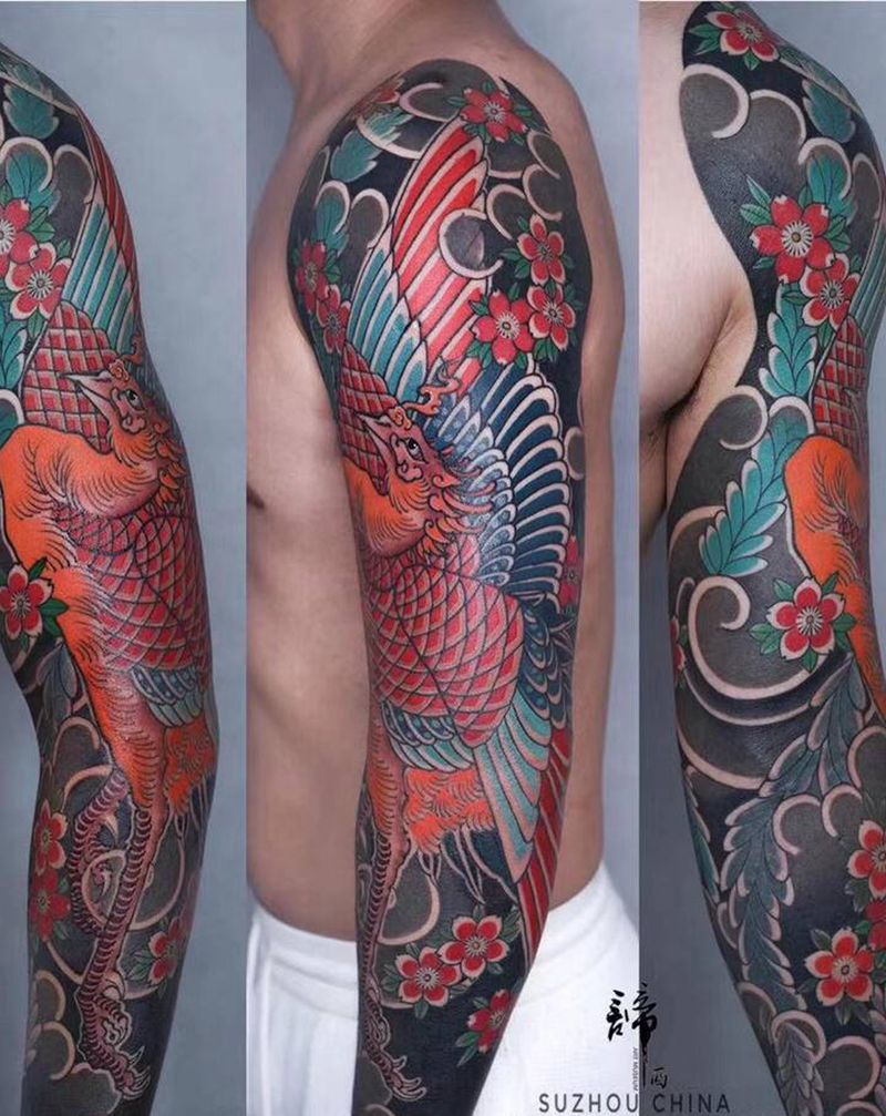 凤凰花臂纹身图片_手臂老传统纹身图案