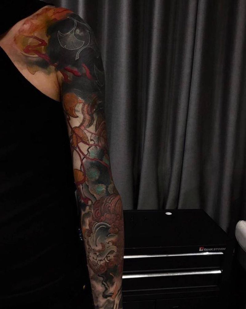 花臂唐狮遮盖伤疤旧纹身纹身图片_手臂新传统纹身图案