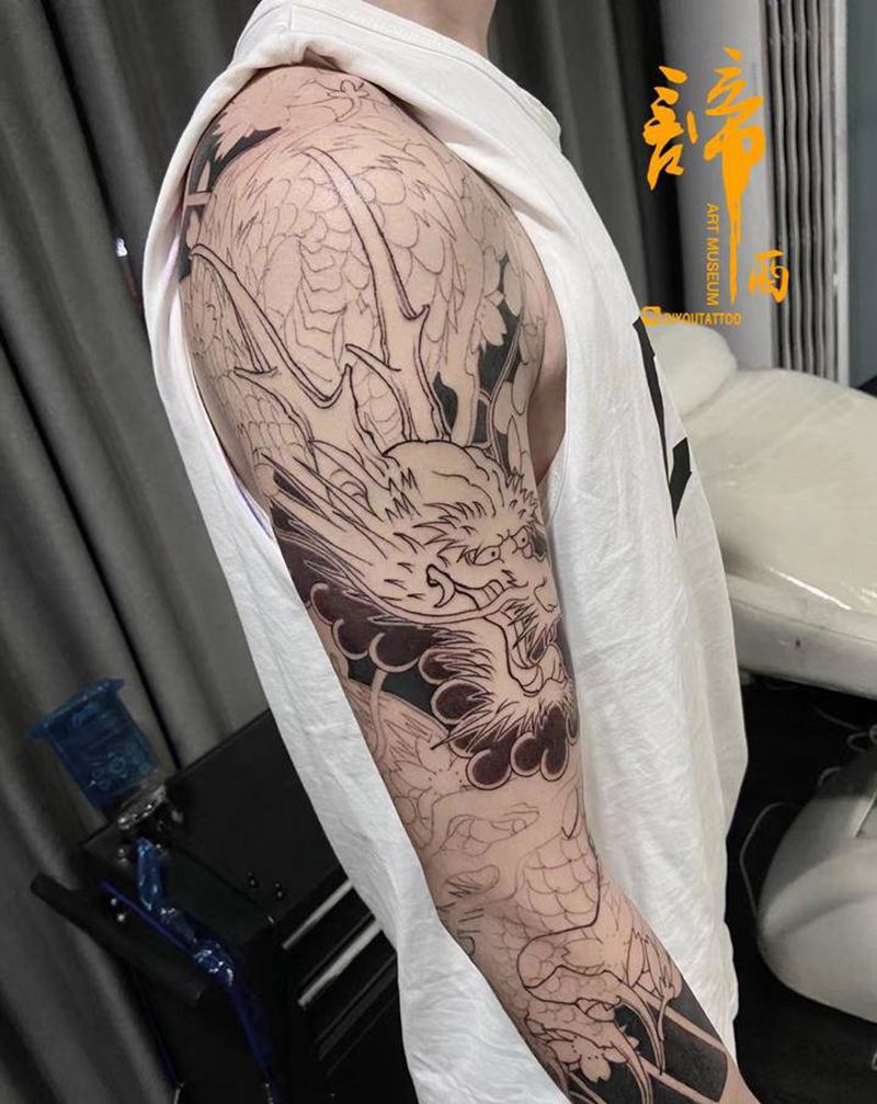 七分袖龙纹身图片_手臂老传统纹身图案
