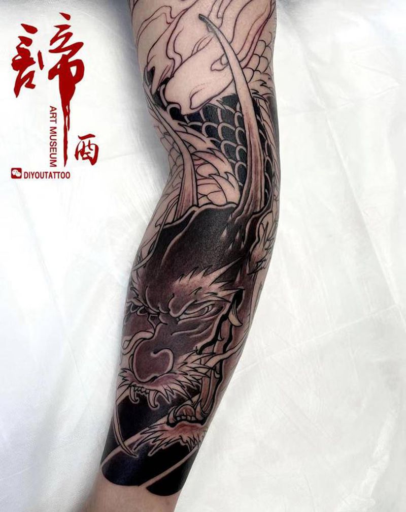 老传统龍花臂纹身图片_手臂老传统纹身图案