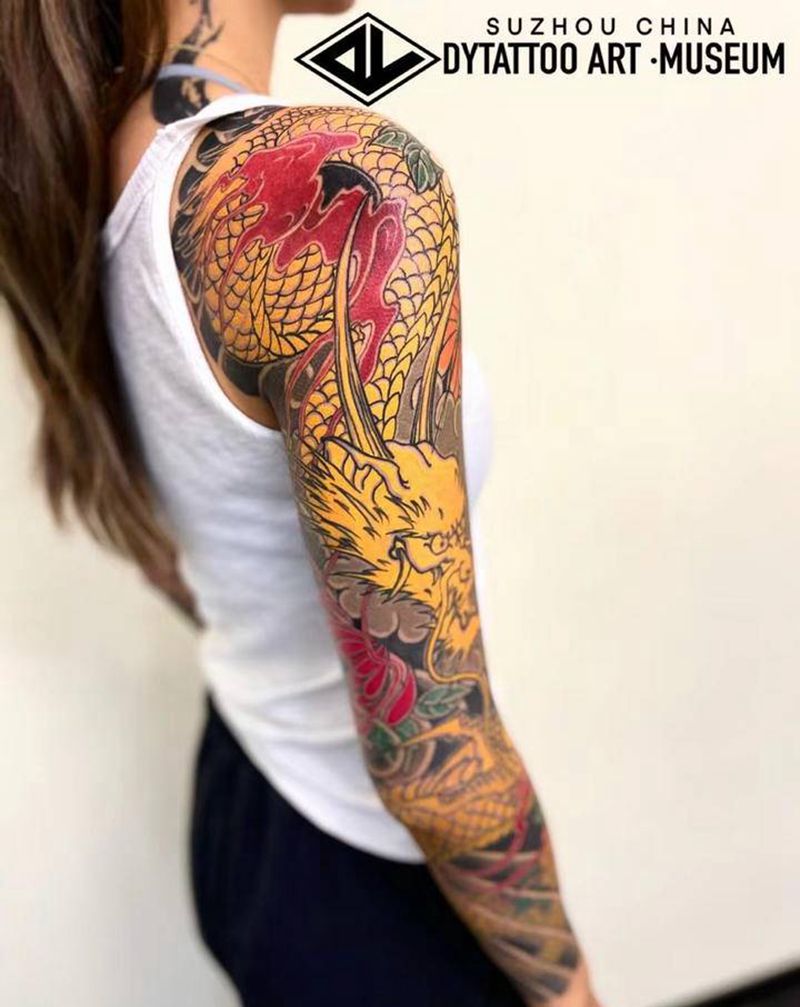 花臂龙纹身图片_手臂老传统纹身图案