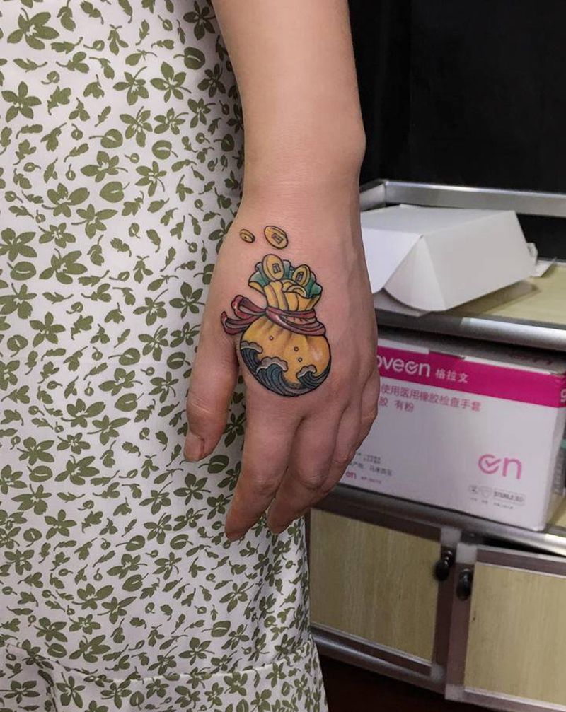 遮盖疤痕，钱袋纹身图片_手部纹身图案