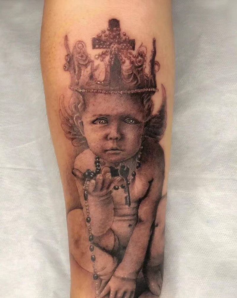 写实小天使纹身图片_手臂欧美写实纹身图案