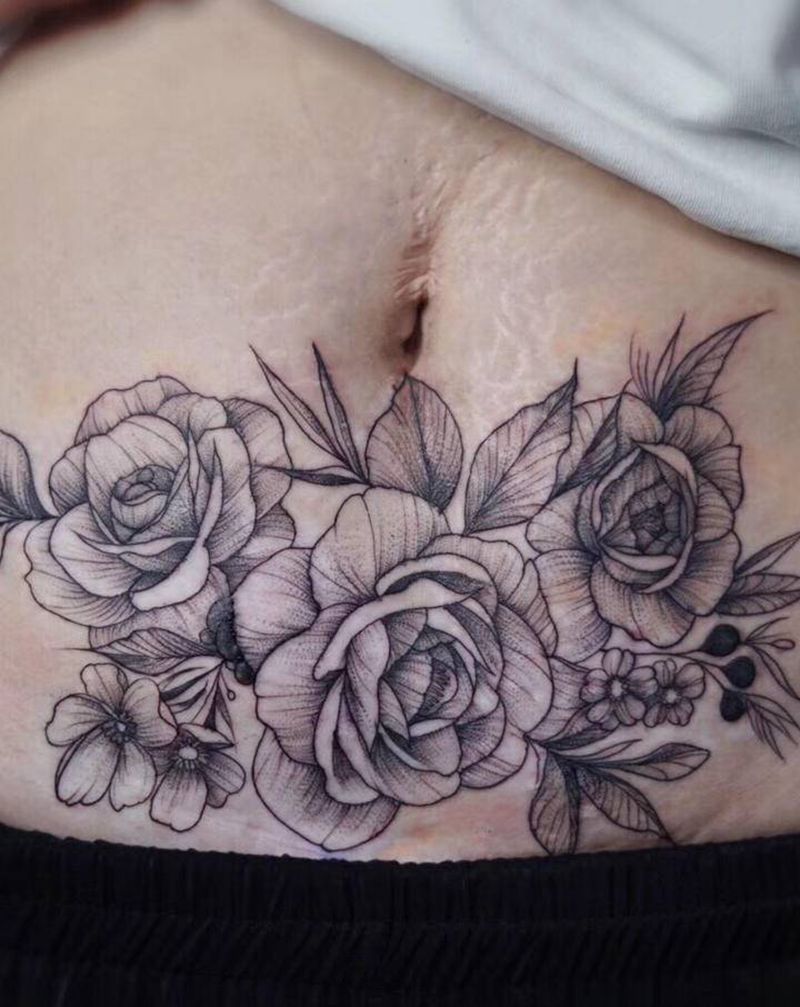 素花妊辰纹遮盖纹身图片_腹部纹身图案