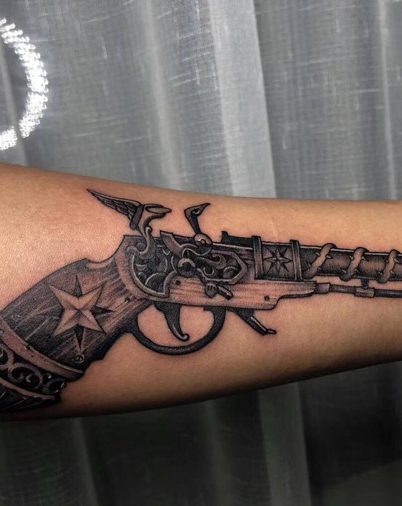 火枪纹身图片_手臂欧美写实纹身图案