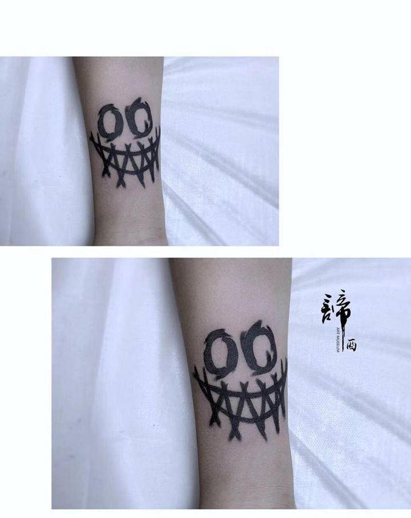 小丑脸纹身图片_手臂Old School纹身图案