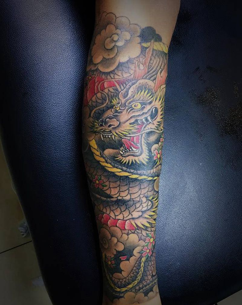 祥云龙包小腿纹身图片_腿部纹身图案