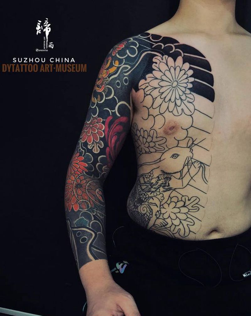 花臂到开衫纹身图片_胸部腹部老传统新传统纹身图案