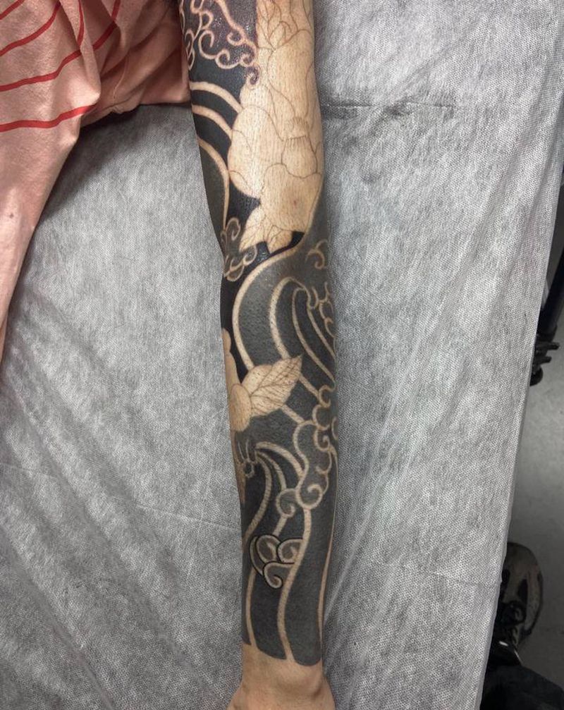 水浪纹身图片_手臂纹身图案