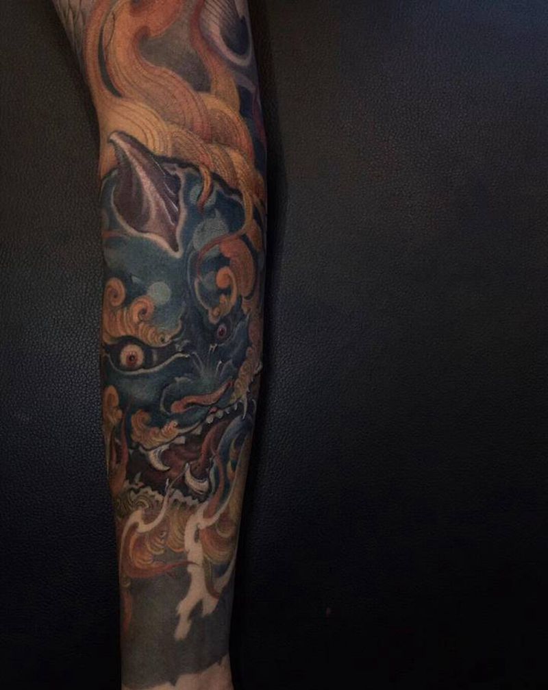 唐狮纹身图片_手臂新传统纹身图案