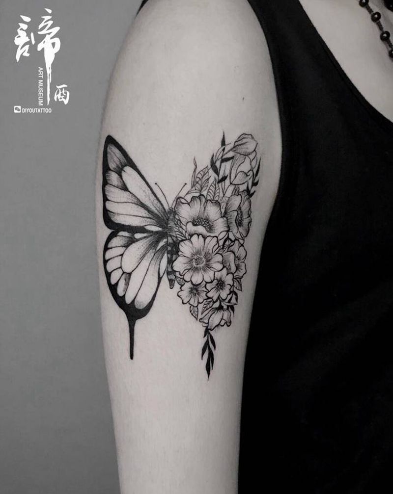 花蝴蝶纹身图片_手臂点刺纹身图案