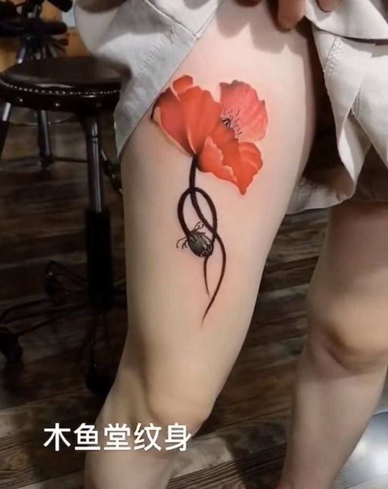 罂粟花纹身图片_腿部水彩纹身图案