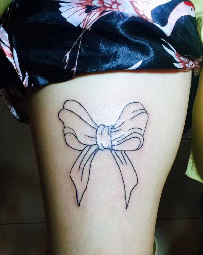 蝴蝶结纹身图片_腿部纹身图案